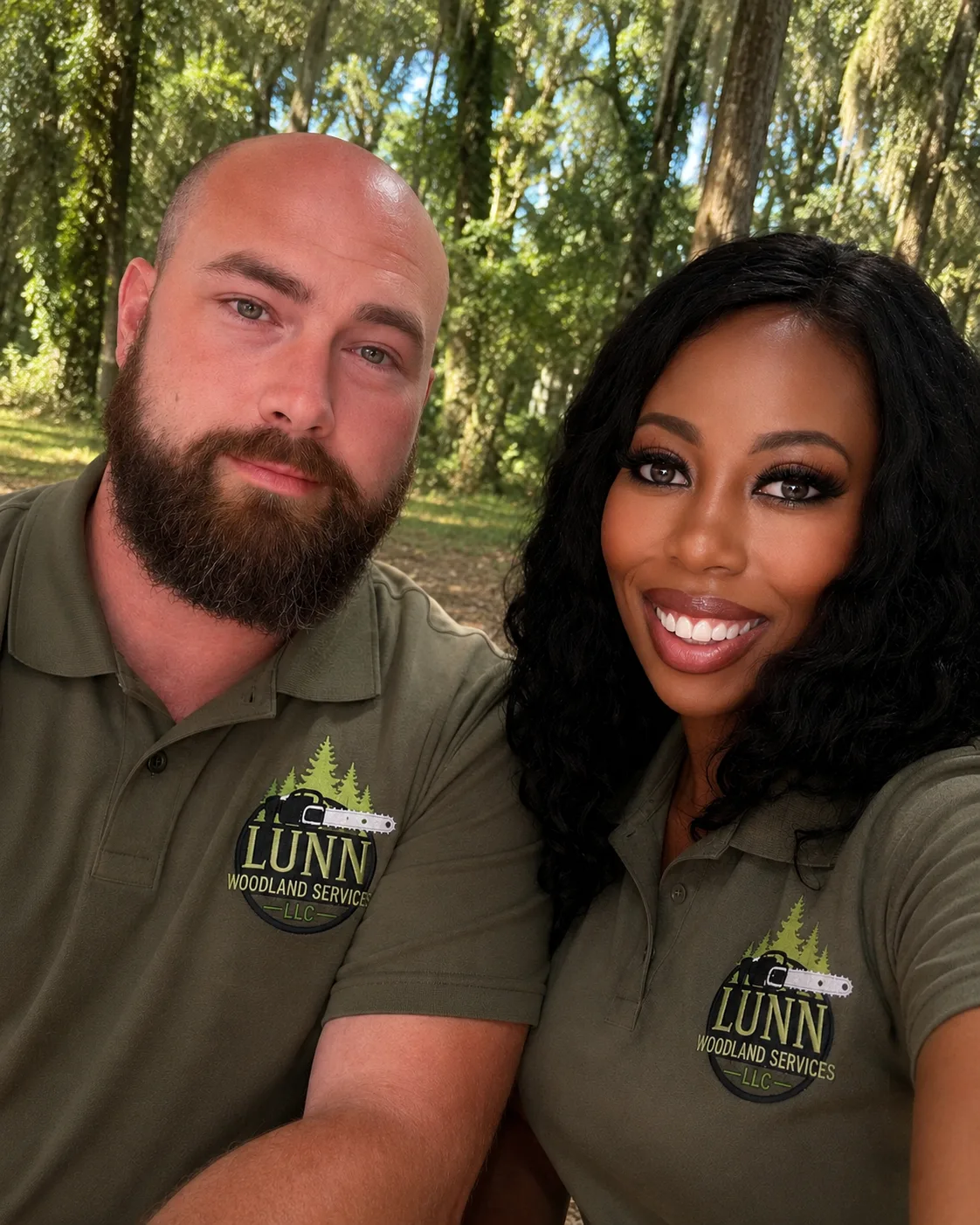 Lunn Woodland Services team members in branded shirts
